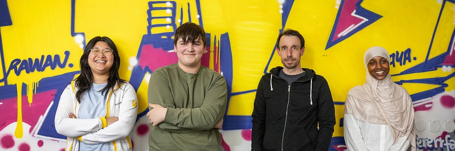 Gruppenfoto von zwei Frauen und zwei Männern.
